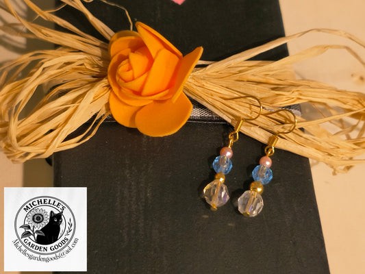 Pink, Blue, Gold and Clear Crystal Earrings
Dimensions H 1.75" x L 0.25" x W 0.25". Weight 0.08 Oz.