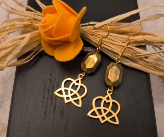Gold Trinity Knot with Bronze Beaded Earrings 
18K Gold Plated Stainless Steel Charm
Dimensions H 2.375" x L 1" x W 0.125". Weight 0.30 Oz.