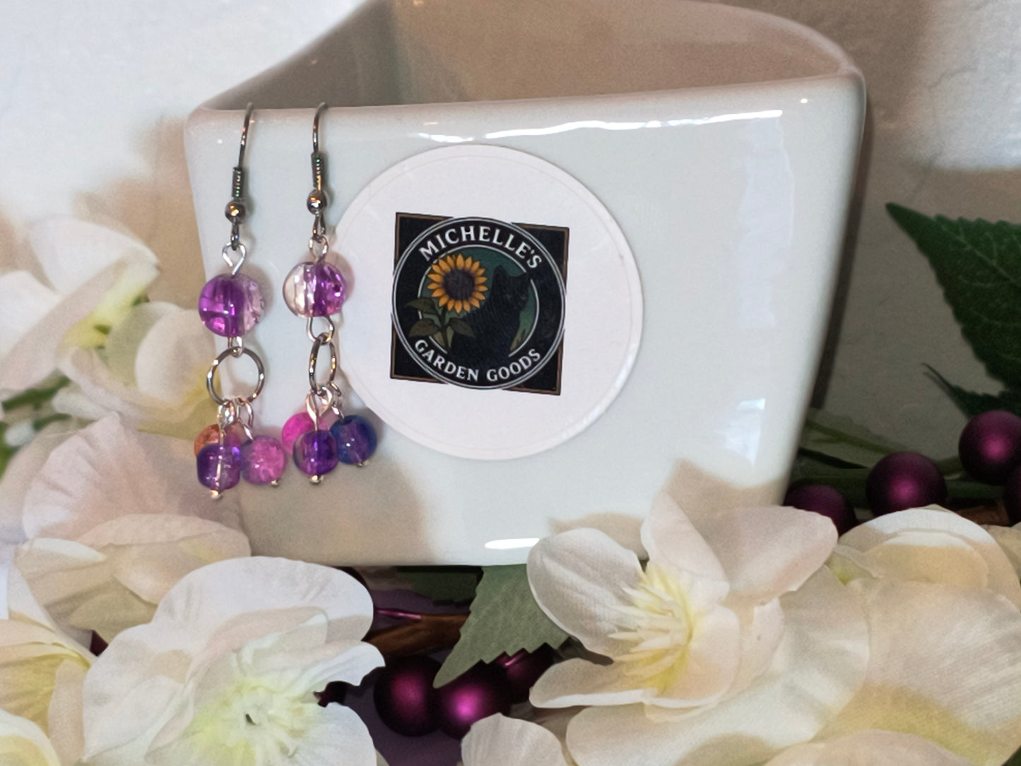Purple Glass Cracked Dangling Beaded Earrings / Silver color
Dimensions H 2" x L 0.625" x W 0.375". Weight 0.15 Oz.