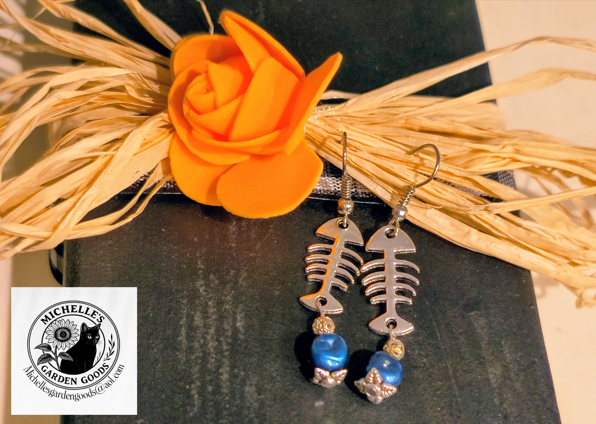 Silver Fishbone Earrings With Blue Stone
Dimensions H 2" x L 0.5" x W 0.25". Weight 0.10 Oz.