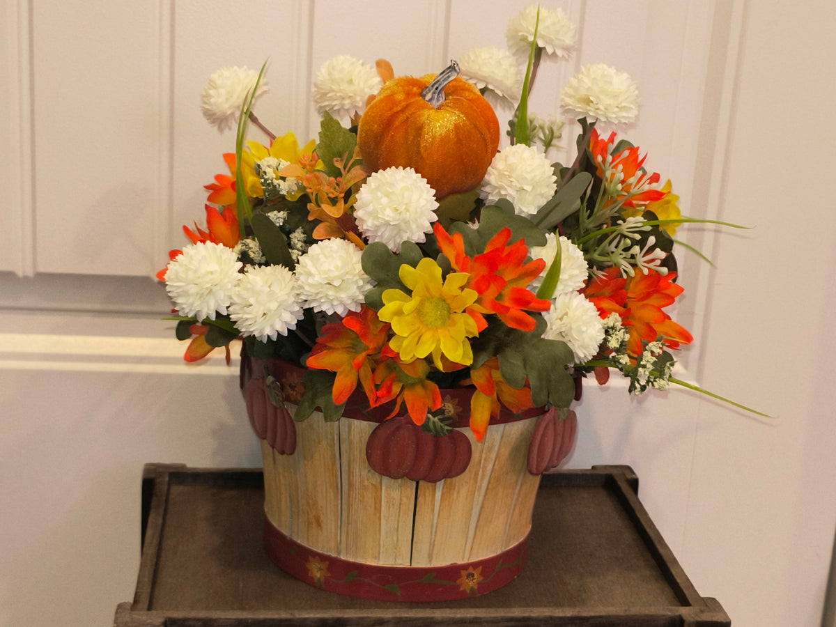 Autumn Flowers in a Pumpkin Basket