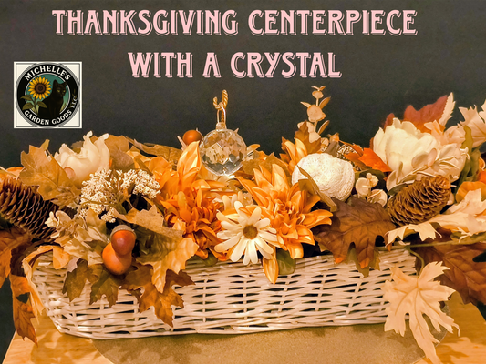 Brighten Up Your Holiday Table with this Thanksgiving Floral Centerpiece with a Beautiful Crystal in the Center
Orange Dahlias with Mums, pinecones, acorns and autumn leaves. Gorgeous Crystal prism in the center.