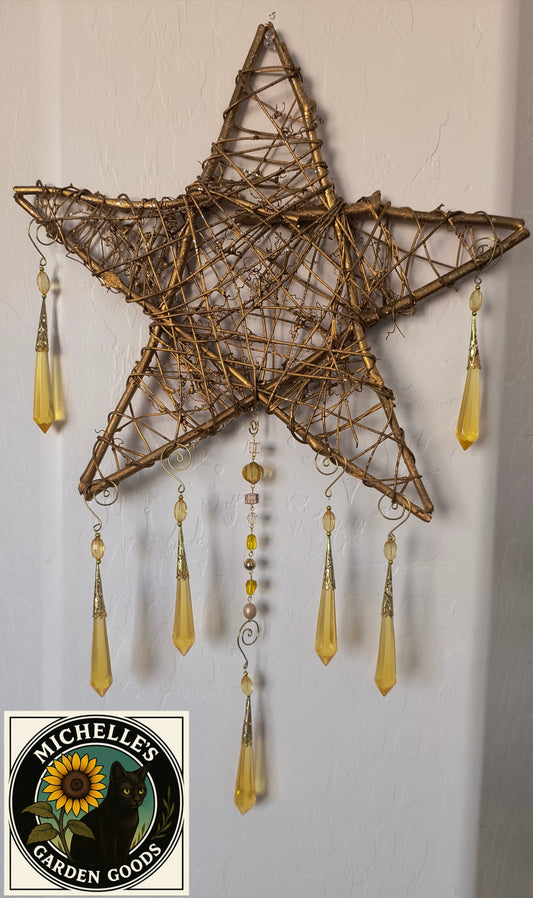 Gold Wicker Star Suncatcher with Teardrop Acrylic Beads
This Beautiful Piece Made Out of Wicker Branches in the Form of a Star Holding the Gold Teardrop Acrylic Beads. This Gorgeous Piece Would Be Beautiful for Home or Office Decor.
Dimensions 24" x 16" x 1". Weight 7.10 Oz.
