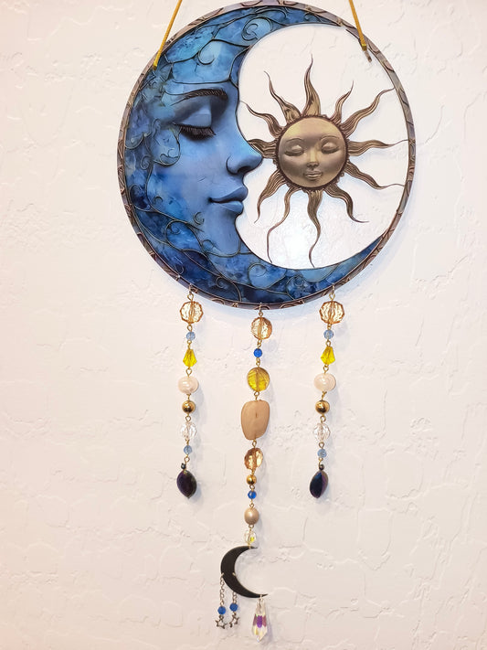 This Moon and Sun Suncatcher 2D Acrylic With Crystal and Glass Beads. This Suncatcher will make The Room Explode in Prism Lights with it's Crystal Beads. Great for the Home or office Window or in the Garden.
Dimensions 15.5" x 8" x 1 mm. Weight 3.23 Oz.