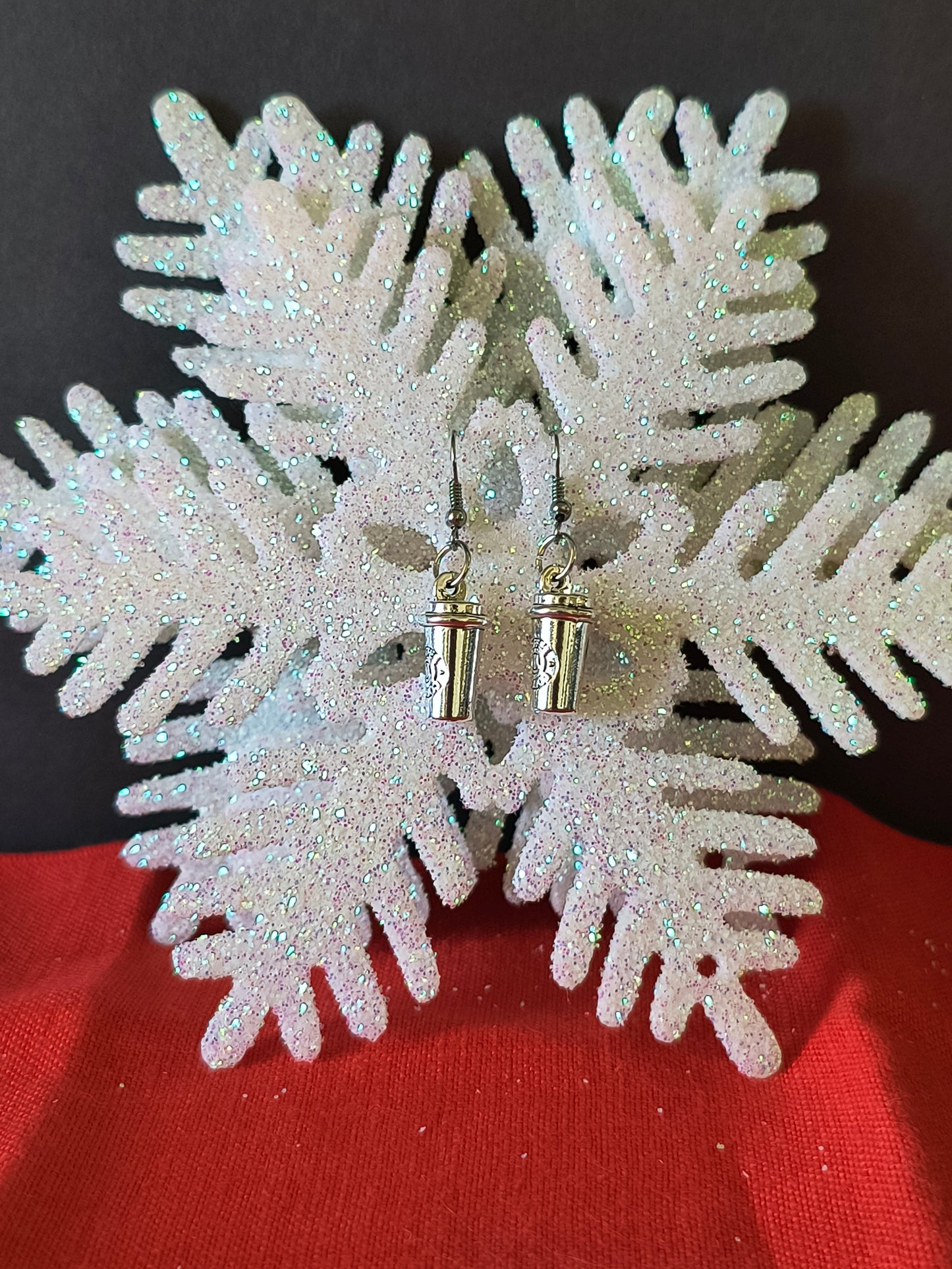 Silver Coffee Cup Earrings
Transform your look with the perfect pair.