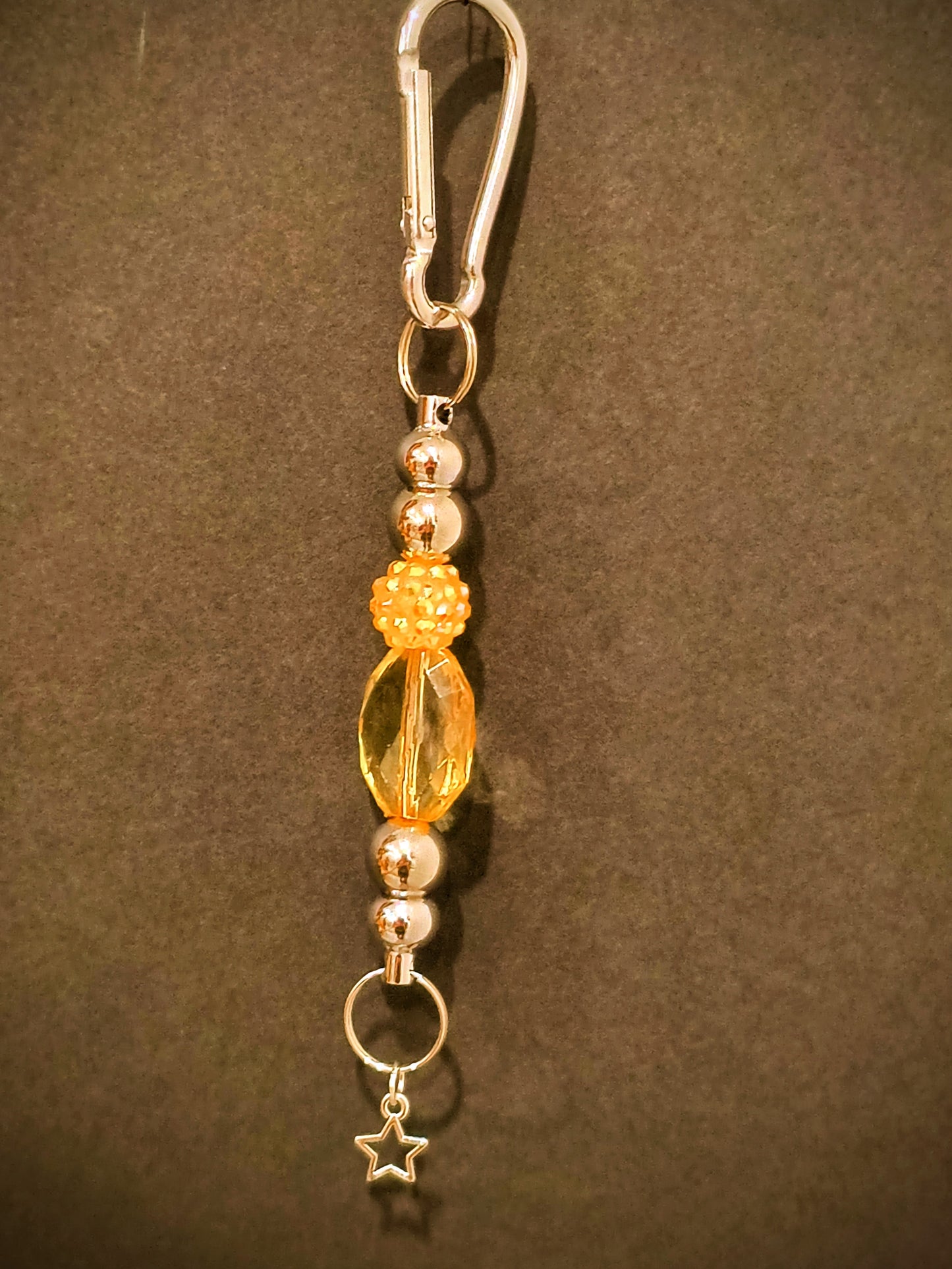 This Cute Decorative Beaded Keychain Will Brighten Up Your Drive. It Can Always Help You Find Your Keys With All The Pretty Glass And Acrylic Beads.
Dimensions .6.5" x 1.5" x .5". Weight 0.53 Oz.