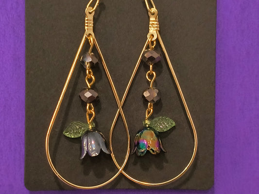 Iridescent Flowers In Gold Teardrop Dangling Earrings
Dimensions H 2.375" x L 1.125" x W 0.375". Weight 0.13 Oz