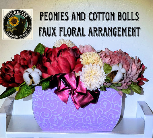 A Beautiful Faux Floral Arrangement in a Lavender Tin Vase with Peonies with Cotton Bolls. Perfect Arrangement for home or office decor. Measurements are 14" x 9" x 10 mm 
