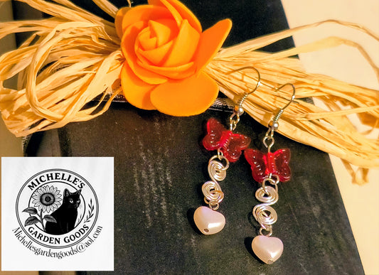 Spiral Silver with Butterfly and Heart Pearl Earrings
Dimensions H 2.375" x L .5" x W 0.375". Weight 0.09 Oz.