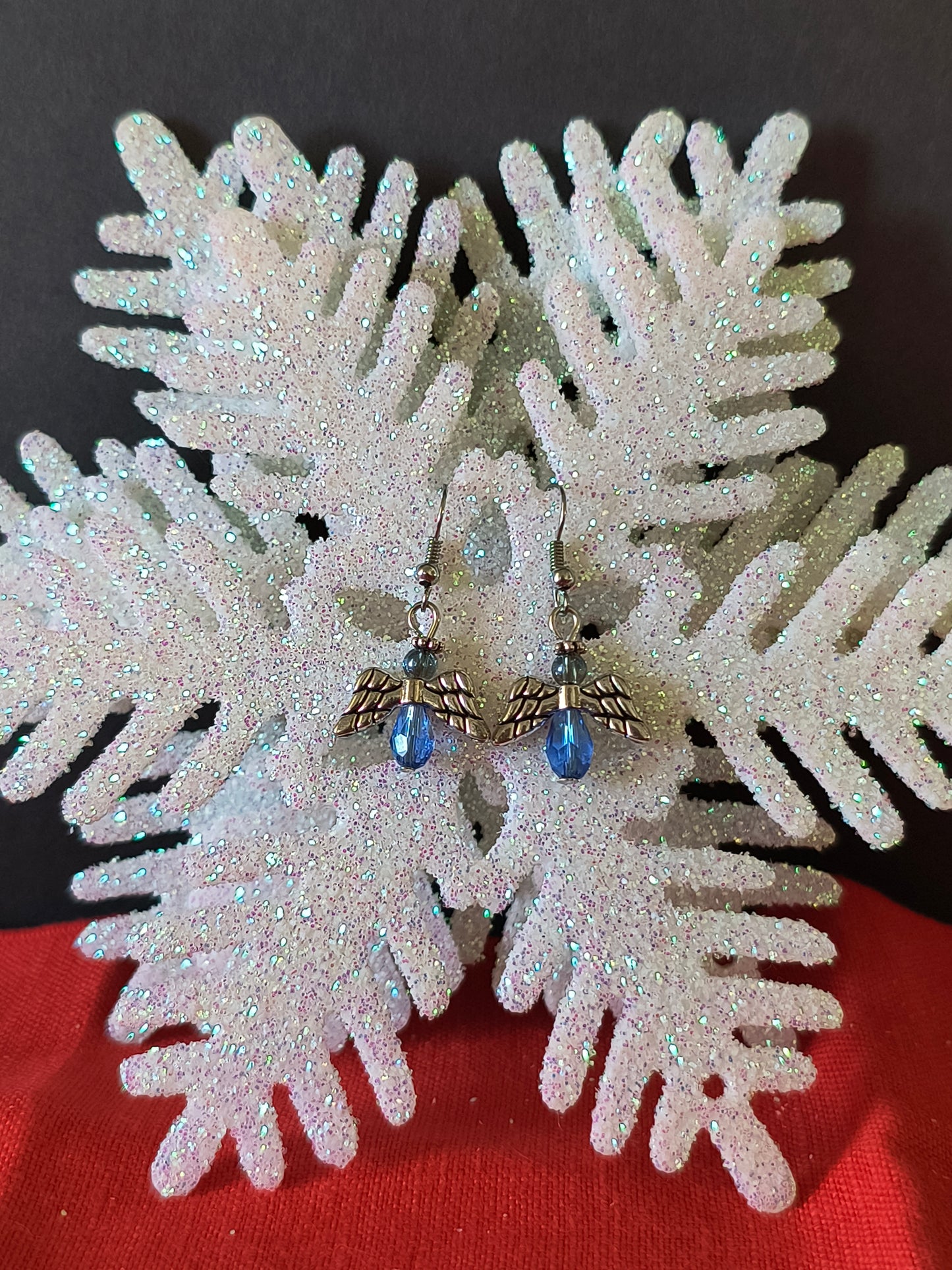 Silver and Blue Angel Earrings
Earrings that speak louder than words