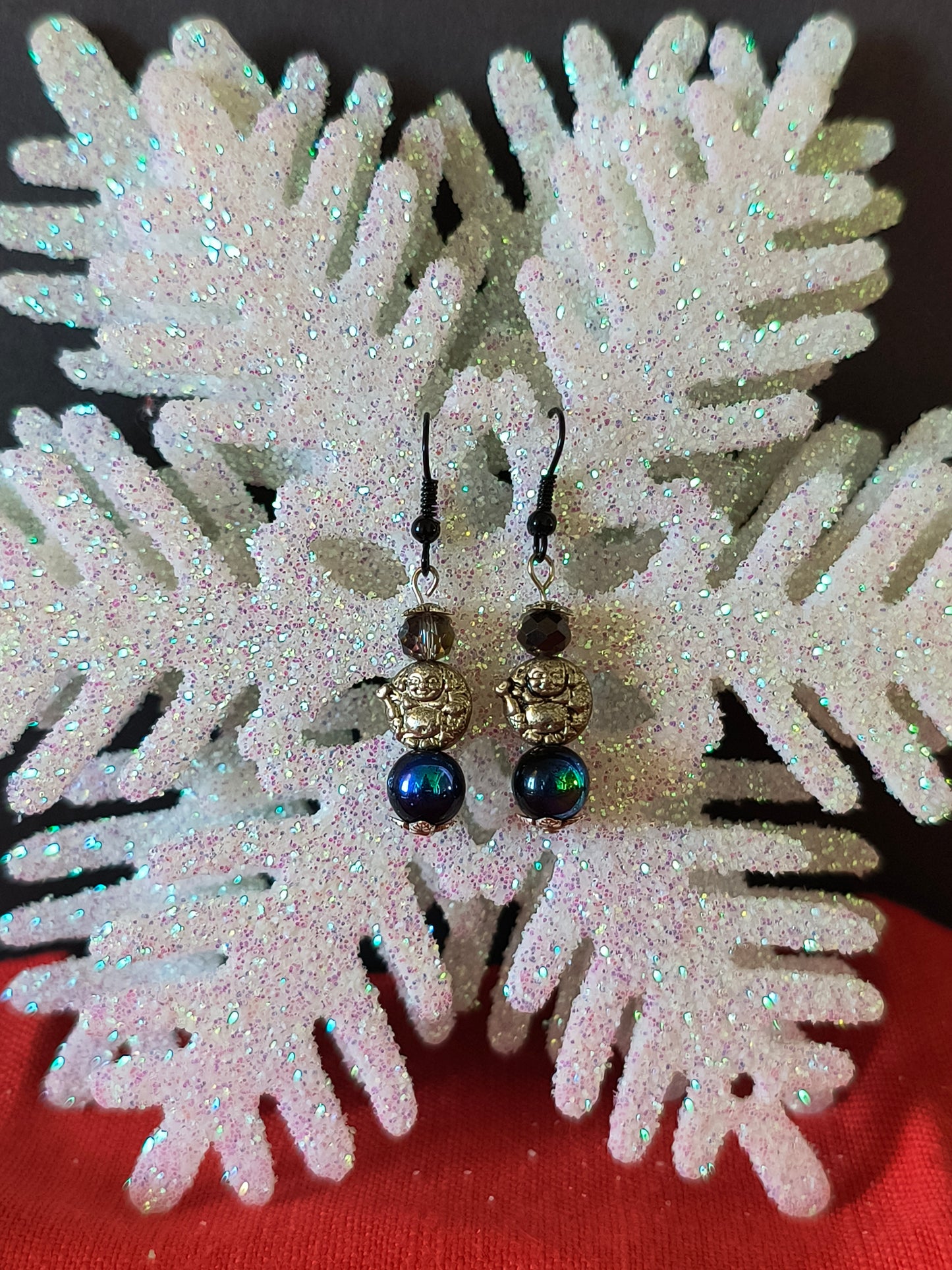 Silver Budda with Rainbow Obsidian Beaded Earrings
Adorn your ears with these cascading drops of good luck and fortune that catch the light with every turn, adding instant glamour to your evening wear.