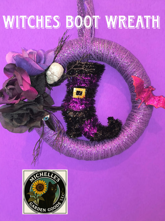 Witches Boot Purple Halloween Wreath made with Purple Ribbon and Cute little Witches Boot Decorated with black and purple Roses. Skull and Eye Decor added for that Spooky Look. Great for Home or Office Decor.

Dimensions 10" x 13" x 5". Weight 4.46 Oz.