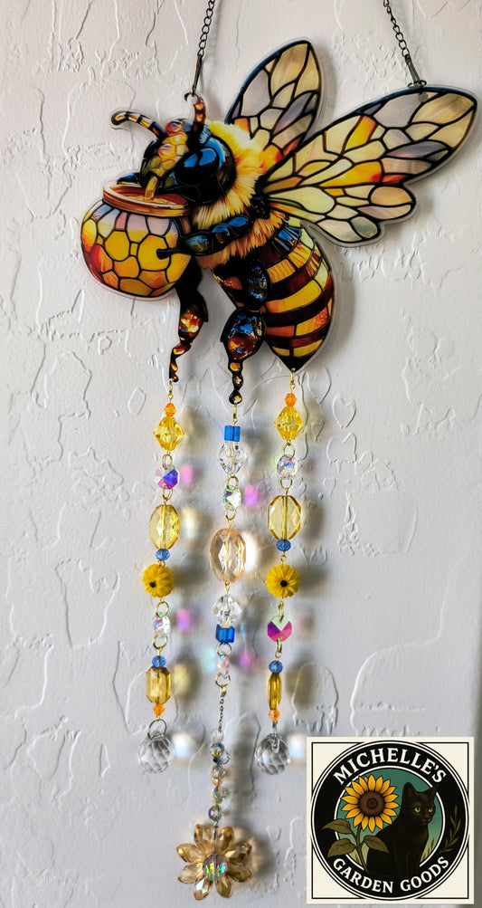 Bee Suncatcher 2D Acrylic With Crystal and Handmade Beads. This Adorable Bee Suncatcher will make The Room Explode in Prism Lights with it's Crystal Beads. Great for the Home or office Window or in the Garden.

Dimensions 19" x 7" x 1 mm. Weight 4.7 Oz.