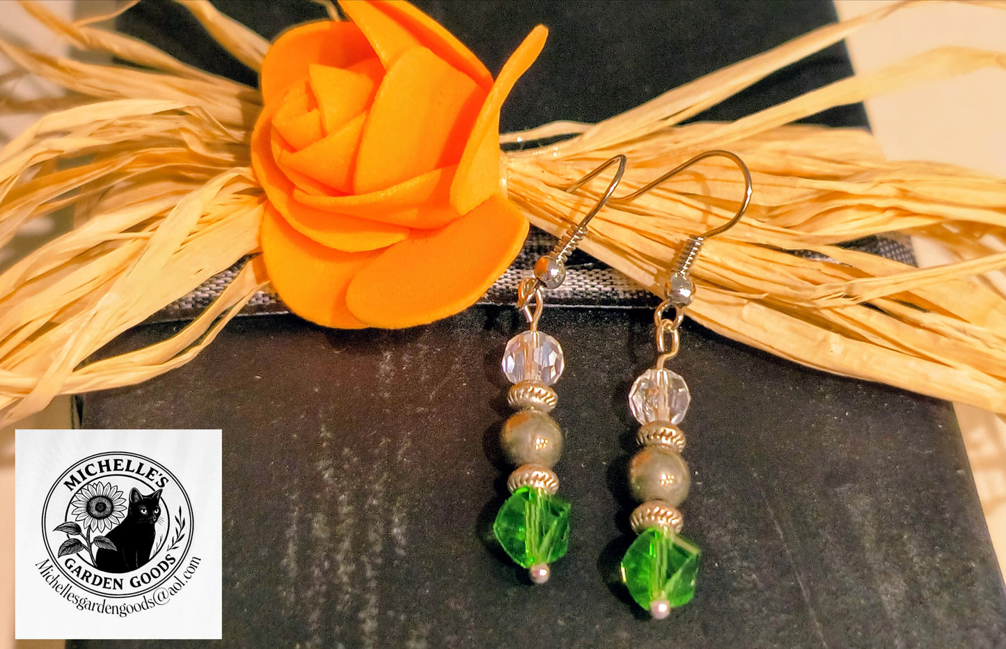 Crystal Beaded Earrings With Silver And Green Beads

Dimensions H 1.75" x L 0.375" x W 0.375". Weight 0.13 Oz.