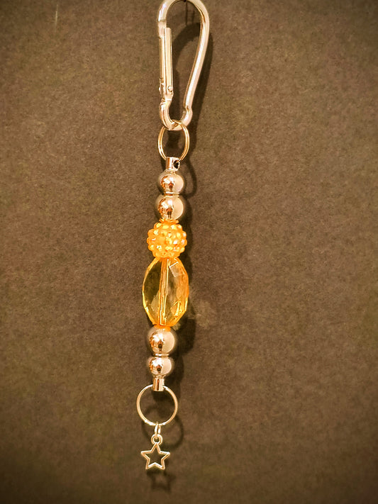This Cute Decorative Beaded Keychain Will Brighten Up Your Drive. It Can Always Help You Find Your Keys With All The Pretty Glass And Acrylic Beads.

Dimensions .6.5" x 1.5" x .5". Weight 0.53 Oz.