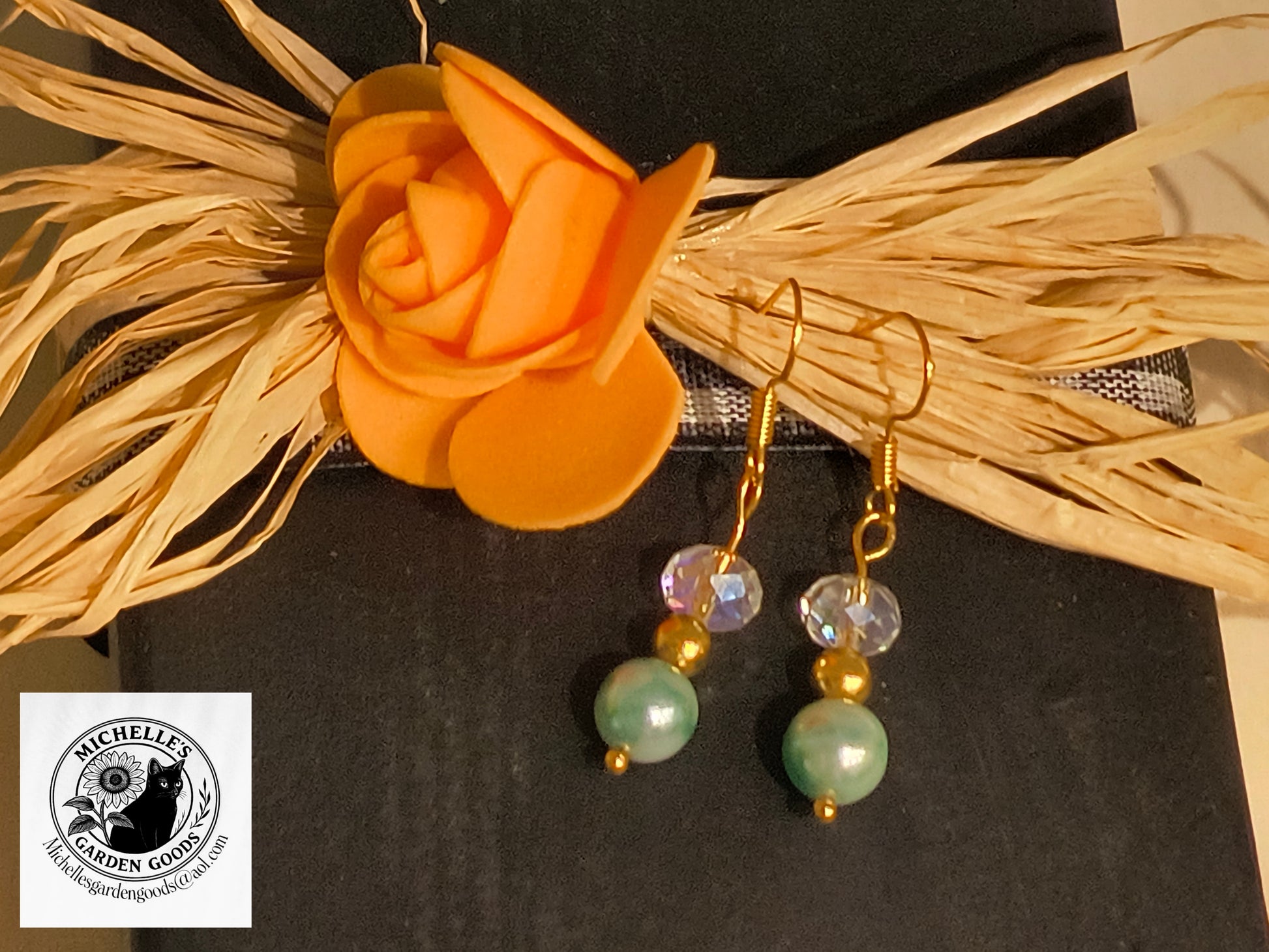 Crystal And Gold Bearded Earrings With A Teal Faux Pearl

Dimensions H 1.75" x L 0.35" x W 0.25". Weight 0.08 Oz.