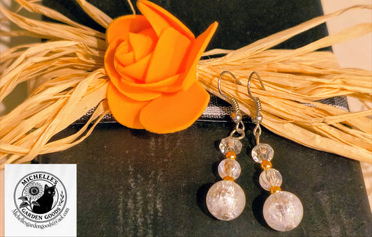 Cracked Glass Dangling Earrings /Gold in color

Dimensions H 1.75" x L 0.5" x W 0.5". Weight 0.07 Oz.