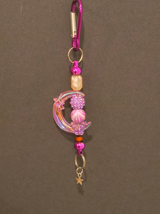 This Cute Decorative Beaded Keychain Will Brighten Up Your Drive. It Can Always Help You Find Your Keys With All The Pretty Glass And Acrylic Beads.&nbsp;

Dimensions .6.5" x 1.5" x .5". Weight 0.53 Oz.